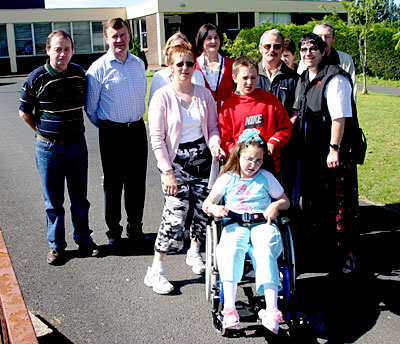  members Martin and Anne Kelly, as well as local wheelchair user Katie 
